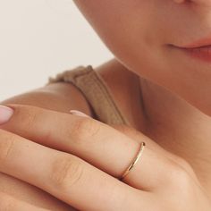 DETAILS
- Made with 14k recycled premium solid gold- Set with round single cut diamonds of H/Si1 Quality


- Total Diamond Weight: 0.03ct
- Band Thickness: 1mm


Five tiny ethically sourced diamonds cradled in the centerpiece of this timeless 14k gold ring. This dainty band is all we ever needed. 14k Gold Fine Jewelry Diamond Ring For Everyday, Minimalist Diamond Ring With Single Cut Diamonds For Promise, Everyday 14k Gold Fine Jewelry Diamond Ring, Minimalist Single Cut Diamond Promise Ring, Dainty Everyday Rings With Single Cut Diamonds, 14k Gold Half Eternity Diamond Promise Ring, Minimalist Diamond Ring With Round Cut Accents, 14k Gold Diamond Ring With Single Diamond, 14k Gold Wedding Band With Diamond Accents