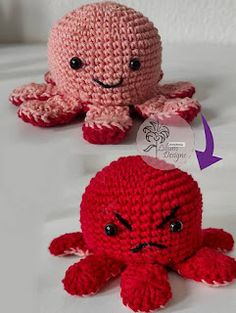 two crocheted octopus stuffed animals sitting next to each other