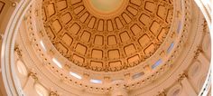 the inside of a building with a domed ceiling