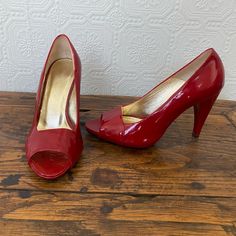 Fabulous Party Shoes! Never Worn Red Patent Leather Peek Toe Pumps. Great Condition, There Is A Wrinkle On The Right Foot Inside (See Photo), But That Will Likely Straighten Out With Wear. 4 Inch Heel. Strap Up Heels, Polka Dot Heels, Black Stiletto Heels, Ankle Strap High Heels, Red High Heels, Round Toe Pumps, Studded Heels, Black Stilettos, Tan Heels