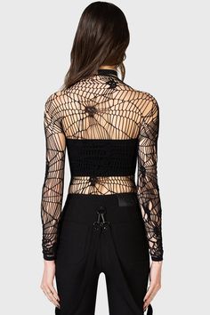 WEBS GRASP.- Soft, stretch fishnet.- Statement web style net with interwoven skulls.- Long sleeves.- Fitted.With KIHILIST branding, 94% Polyamide, 6% Elastane.Hand wash cold (30°c) / Do not bleach / Do not tumble dry / Iron at low temperature / Do not dry clean. Imported. Gothic Mesh Top With Mesh Sleeves, Stretch Mesh Top With Open Knit, Stretch Open Knit Mesh Top, High Stretch Mesh Top For Party, Black Sheer Mesh Top Gothic Style, Gothic Mesh Top For Spring Party, Spring Gothic Party Mesh Top, Spring Party Gothic Mesh Top, Edgy Stretch Mesh Top For Club