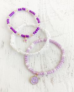 This beautiful hand beaded bracelet stack is sure to suit any occasion, made with durable stretchy material. Made to fit and average adult wrist, please message me directly if you need a size adjustment. (Ex. Smaller or larger than average) Beaded Bracelet Ideas, Diy Pearl Necklace, Beaded Bracelet Stack, Purple Beaded Bracelets, Beads Rings, Pearls Diy, Bracelet Ideas, Beaded Rings, Bracelet Stack