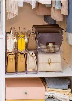 an organized closet with handbags and purses