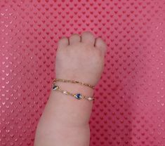 Baby Eve Bracelet This adorable blue heart baby and toddler bracelet is the perfect accessory for your little one. Adjustable Size: The bracelet can be easily adjusted to fit comfortably on your baby or toddler's wrist. Blue Heart Design: Featuring a cute blue heart charm, this bracelet adds a touch of charm to any outfit. Toddler Bracelet, Blush Boutique, Baby Bracelet, Baby Jewelry, Baby And Toddler, Blue Heart, Handmade Baby, Heart Design, Heart Charm