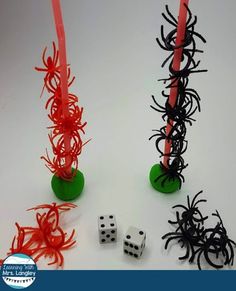 two halloween games with dices and spider on them