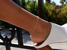 This gorgeous dainty Double Layered Anklet comes in either 14k gold vermeil or sterling silver and is the perfect accessory for the summer. The anklet can be worn on it's own or could easily be layered. Wear this to any occasion and be ready to shine! The anklets are 8 inches long with a 2.5-inch extender chain with a total length of 10.51 inches. Option to select gold vermeil or sterling silver SHIPPING & PACKAGINGNO EXTRA SHIPPING COST for additional items in your order! All orders are shi Gold Anklets As Spring Gift, Gold Anklets For Everyday Summer Wear, Delicate Gold Bracelets For Summer, Dainty Summer Anklets, Minimalist Hypoallergenic Anklets For Summer, Elegant Spring Anklets For Gift, Elegant Spring Anklets For Gifts, Elegant Spring Anklets As Gifts, Hypoallergenic Minimalist Summer Anklets