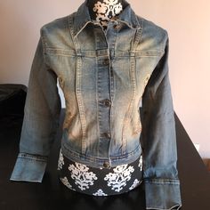 Beautiful Unique Design! Swayze Distressed Embroidered Jean Jacket Nwt! Amazing Embroidered Design Front And Back With Bronze Studs! ** Please Note That It Runs Smaller Than A Size “Small”** Small: Pit To Pit: 16” Shoulders Seam To Seam: 14” Shoulder To Hem: 20” Distressed Fitted Outerwear For Spring, Distressed Fitted Button-up Outerwear, Fitted Button-up Distressed Outerwear, Fitted Distressed Button-up Outerwear, Fitted Distressed Denim Blue Outerwear, Fitted Distressed Blue Outerwear, Fitted Blue Distressed Outerwear, Embroidered Jean Jacket, Embroidered Jeans