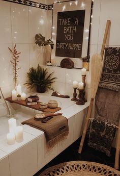 a bathroom decorated with candles and decor