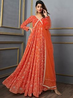 Colour: orange & white Floral printed V-neckLong, regular sleevesAnarkali shape with empire styleGotta patti detailAnkle length with flared hemMachine weave regular georgette V-neck Anarkali Set For Diwali, Designer Orange Salwar Kameez, Semi-stitched Orange Cutdana Anarkali Set, Orange Semi-stitched Salwar Kameez With Cutdana, Anarkali Set With Sheer Dupatta And V-neck, V-neck Anarkali Set With Dupatta, Orange Georgette Sharara For Navratri, Orange Kurta With Cutdana For Eid, Orange Cutdana Kurta For Eid