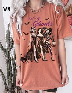 Vintage Spooky Girl Halloween Shirt Comfort Colors garment-dyed t-shirt, made 100% with ring-spun cotton. The soft-washed, garment-dyed fabric brings extra coziness to your wardrobe while the relaxed fit makes it an excellent daily choice. These are Unisex fit tees, please make sure to check the size chart in the photos. *Returns* - All sales are final unless the item arrives damaged *Shipping* - Allow 3-7 business days for order to be processed and made - USPS shipping time is 3-5 business days - Double check shipping address is correct before placing order -We are not responsible for lost or stolen packages Pin Up Girl Halloween, Diy Halloween Shirts, Lets Go Ghouls, Vintage Spooky, Halloween Crewneck, Girl Halloween, Cat Halloween, Girls T Shirt, Diy Shirt