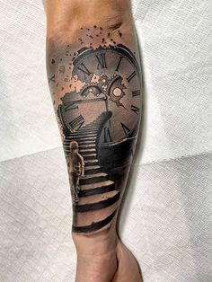 a man's leg with a clock on it and stairs going up to the sky