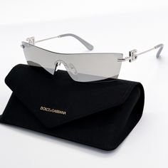 100% New Authentic Eyewear With Full Package Brand: Dolce&Gabbana Model: Dolce&Gabbana Dg2292 05/6g Condition: New With Full Package Frame Color: Silver Lens Color: Grey Frame Material: Metal Lens Socket: 37 Mm Bringe Width: 0 Mm Temple Length: 145 Mm Made In Italy Item Included: Authentic Eyewear, Certificate Of Authentic, Cleaning Cloth, Case, Box, Bag. Silver Rimless Sunglasses For Formal Occasions, Chic Shield Sunglasses For Summer Formal Events, Chic Shield Sunglasses For Formal Summer Events, Luxury Rimless Sunglasses For Party, Silver Rimless Sunglasses For Evening, Silver Rimless Evening Sunglasses, Luxury Rimless Party Sunglasses, Elegant Rimless Shield Sunglasses With Mirrored Lenses, Silver Rimless Sunglasses For Party