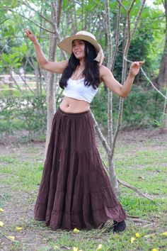 From Twist and Crinkle Collection Colour light brown with a tinge of green  It's a similar skirt to my smock elastic waist skirts. For those people who prefer the smaller waistband. This lovely Boho piece is made from 100% cotton. It's half-lined with an elastic waistband. and ties The skirt is in 5 tiers. It is a great piece to wear with a tight or cropped top. It is very comfortable to wear and easy to care for, no need to iron just twist and crinkle and tie it with an elastic to keep it together Please note this is not a bleached white coloured skirt. Wash on a cold cycle, hang to dry, or tumble dry low Waist 22'' inches - 42'' inches Hips 56'' inches free size Length 39'' inches For your reference, the model is ( 5'1 tall , 32'' bust , 27'' waist and 35 '' hips ) Brown Skirted Bottoms For Vacation, Bohemian Style Solid Color Lined Skirt Bottoms, Bohemian Solid Color Skirted Bottoms, Bohemian Style Skirted Bottoms, Bohemian Skirted Bottoms, Bohemian Solid Color Lined Skirt, Brown Long Skirt For Vacation, Brown Full Length Skirt, Bohemian Skirted Bottoms In Brown