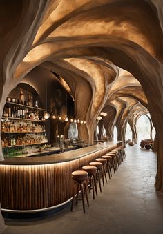 the interior of a bar with wooden stools