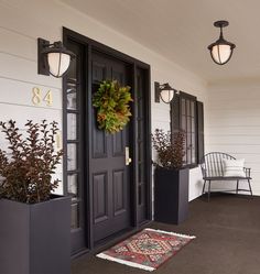 an image of two front doors with plants on the porch and one has a sign that says rejuvenation shared link