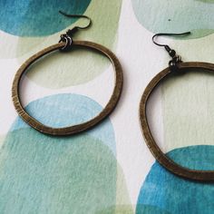 "Hammered Brass hoop earrings brass hoop 2\" dIameter Simple hammered pattern a great simple earring For everyday wear orders over 35$ automatically receive free shipping ---------------------------------------------------- made for you by me iheartmies in my home studio in Portland Oregon all jewelry comes ready to gift in eco friendly packaging that can be recycled envelopes and packaging materials are also recyclable" Hammered Bronze Metal Hoop Earrings, Bronze Hammered Metal Hoop Earrings, Everyday Bronze Brass Hoop Earrings, Bronze Nickel-free Hoop Earrings, Everyday Hand Forged Brass Hoop Earrings, Electroformed Brass Hoop Earrings, Recycled Envelopes, Brass Hoop Earrings, Bronze Earrings