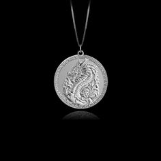 Unleash your inner fire with our Dragon pendant. Crafted with exquisite detail, this powerful piece embodies the untamed strength and mystique of the dragon, a symbol of wisdom and fierce protection. Feel the energy of this ancient guardian as it wraps you in its embrace, reminding you of your own unyielding spirit and the burning passion within. PENDANT INFORMATIONThis pendant is made of real, solid gold.• Made in USA• Material: 14k or 18k solid gold• Finish: polished• Height: 1.13" (29 mm) x W Burning Passion, Symbol Of Wisdom, Gold Dragon, Dragon Necklace, White Gold Pendant, Mythical Creature, Solid Gold Chains, The Burning, Mini Pendants