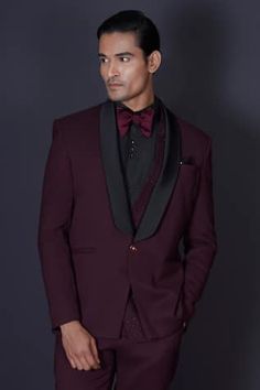 Maroon tuxedo blazer featuring kardana beads hand embroidered work behind a contrasting black lapel. Comes with a vest, black shirt, pant and a bow-tie. - Aza Fashions Tailored Party Wear Blazer For Semi-formal Occasions, Festive Tailored Blazer For Evening, Festive Evening Tuxedo Sets, Tailored Bandhgala For Semi-formal Occasions, Festive Party Wear Formal Blazer, Tailored Suits For Formal Party Wear, Festive Tuxedo Suits For Party, Festive Evening Suits With Suit Collar, Festive Evening Suit With Suit Collar