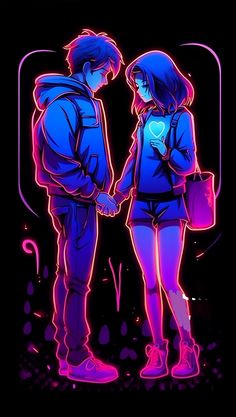 two people standing next to each other in the dark