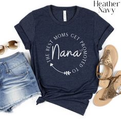 the best moms cry proud mama t - shirt is shown next to denim shorts and sandals