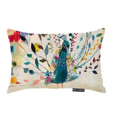 a decorative pillow with an image of a peacock and flowers on the front, in white background