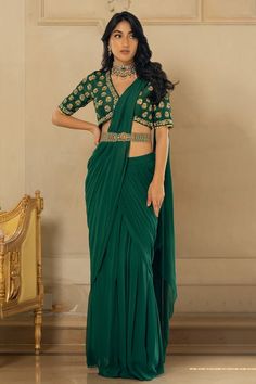 Emerald green georgette pre-stitched saree with pleats. Comes with a tussar silk padded blouse with floral motifs, sequins and zari hand embroidery and a belt - Aza Fashions Designer Pista Green Georgette Blouse, Elegant Unstitched Green Choli, Fitted Green Saree For Festive Occasions, Green Fitted Saree For Festive Season, Elegant Pre-draped Saree In Pista Green For Festive Occasions, Elegant Pista Green Pre-draped Saree For Festive Occasions, Elegant Green Festive Choli, Georgette Blouse Piece For Formal Navratri, Pista Green Georgette Blouse With Dupatta