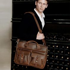 From the upscale streets of Paris, to the classic waterways of Venice, The European leather briefcase is built for the premium modern gentleman. This men's leather briefcase is classic, yet convenient. Built with ample space, this leather bags can carry all your gear - wherever your day may take you. Made from quality full grain crazy horse leather (so named as it was commonly used for premium leather saddles), this men's leather briefcase is professional and mature, yet made to be rugged and ha Classic Business Bags With Pockets, Classic Business Briefcase, Classic Business Briefcase With Pockets, Classic Travel Briefcase With Pockets, Business Laptop Bag Satchel With Pockets, Leather Business Briefcase With Pockets, Leather Briefcase With Pockets For Business, Classic Office Bags With Pockets, Classic Business Bags With Anti-theft Pocket