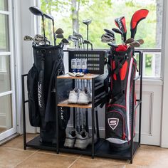 a rack with golf clubs and shoes on it