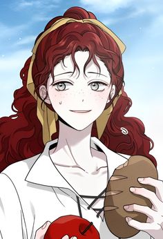 a woman with red hair holding an apple