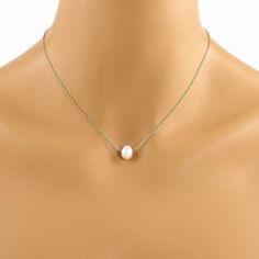 Wear this lovely necklace to the office or an evening out. Made with a single white 9mm freshwater pearl suspended from 14k gold filled chain, with 14k gold filled lobster clasp. The necklace is available in four necklace lengths. Please choose the length you need from the drop-down menu. The pearl size for this necklace is 9mm. There is a bead size chart in the last photo so you can see what 9mm will look like. The necklace will arrive in an attractive gift box. Dainty Pearl Pendant Drop Necklace For Gift, White Pendant Charm Necklace For Formal Occasions, Simple White Necklace For Gift, White Drop Necklace With Pearl Charm As Gift, White Drop Necklace With Pearl Charm For Gift, Simple Pearl Chain Necklace For Gifts, Classic Pearl Pendant Charm Necklace As Gift, Classic Charm Necklace With Pearl Pendant For Gift, Classic Pearl Pendant Charm Necklace For Gift