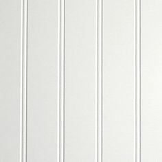 a white wall with vertical lines painted on it