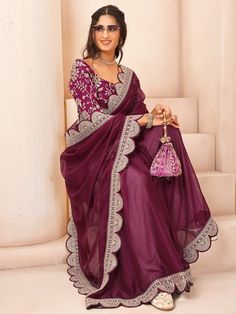 Mauve and gold-toned sareeSolid saree with embroidered borderHas sequinned detailThe saree comes with an unstitched blouse pieceThe blouse worn by the model might be for modelling purpose only. Check the image of the blouse piece to understand how the actual blouse piece looks like. Semi-stitched Sharara With Embroidered Border For Reception, Floor-length Sharara With Embroidered Border For Eid, Eid Floor-length Sharara With Embroidered Border, Eid Reception Anarkali Set With Embroidered Border, Eid Embroidered Border Floor-length Sharara, Floor-length Sharara With Embroidered Border For Festivities, Georgette Pre-draped Saree With Dupatta For Diwali, Bollywood Style Embroidered Sets For Reception, Bollywood Sets With Embroidered Border For Reception