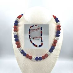 This necklace is customizable in your favorite team colors. Whether you are a dedicated sports fan, a thoughtful gift giver or just want to make game day fun this necklace is for you! Necklace comes with a 2 inch extender chain. Please message seller with color choices. Team Spirit Round Beads Jewelry For Game Day, Blue Team Spirit Jewelry For Game Day, Sporty Jewelry For Game Day, Sporty Team-colored Jewelry For Game Day, Sporty Jewelry For Baseball Season Game Day, Sporty Red Jewelry For Game Day, Sporty Jewelry For Baseball Game Day, Sporty Jewelry For Baseball Season, Personalized Team-colored Sports Jewelry