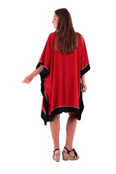 Enjoy this short caftan cover-up. It is ideal for wearing around the house, dressing it up to go out to lunch, or even making a statement on your vacation, or cruise. Easy to wear with endless possibilities. length 38” width 43” Made from 100% soft Rayon Hand-painted design Hand wash in cold water, hang to dry Oversized Short Sleeve Poncho, Oversized Tunic Kimono For Beachwear, Oversized Poncho With Batwing Sleeve For Vacation, Oversized Tunic With Kimono Sleeves For Beach Cover-up, Relaxed Fit Poncho For Beach, One Size Red Poncho For Beach, Red One-size Poncho For The Beach, Red One Size Poncho For The Beach, Red One Size Poncho For Beach