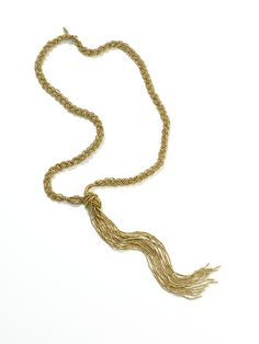 Braided golden long necklace that can be adjusted to the size that you want. You can make a knot or wrap it around your neck or use it as a belt. The open end allows you to play with it and tie it any way you wish. Enjoy! Option: Necklace in silver --------------------------------------- FEATURES Materials used: brass --------------------------------------- Check more necklaces by Moksha Jewelry: http://etsy.me/2qRPZvj --------------------------------------- Back to our shop www.etsy.com/shop/Mo Bohemian Gold Tassel Necklace As Gift, Bohemian Gold Tassel Necklace For Gift, Bohemian Gold Tassel Necklace, Bohemian Multi-strand Lariat Necklace With Adjustable Chain, Adjustable Lariat Long Necklace With Chain, Party Lariat Necklaces With Beaded Chain, Gold Lariat Necklace With Long Drop Chain, Gold-tone Lariat Chain Necklace, Adjustable Gold Long Necklace For Formal Occasions