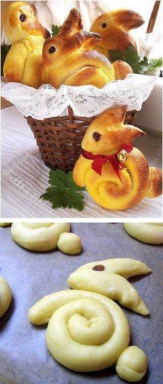 there are some bread buns in the basket and on the table with other pastries