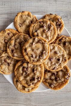 chocolate chip cookies arranged on a white plate