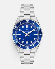 Case diameter: 40 mmCase thickness: 11.8 mmMaterial: Rhodium-plated 316L stainless steelDial: Blue dial in brass Bezel: Rotating ceramic bezelIndex & hands: Applied indices, luminous handsGlass: Flat Sapphire Crystal GlassMovement: Ronda 715Second hand: Yes, tickingWater Resistance: 10 ATM (snorkeling)Strap: Solid stainless steel with white gold PVD platingSize: All our straps are adjustable and fit wrists of all sizes Bracelet size: Available in size S, M & L. See our size chart to find your si Formal Blue Watch With Metal Dial, Blue Stainless Steel Watch Accessory With Metal Dial, Blue Analog Stainless Steel Watch Accessories, Luxury Blue Stainless Steel Watches, Blue Water-resistant Watch With Round Dial, Timeless Watches, Snorkeling, Bracelet Sizes, Stainless Steel Case