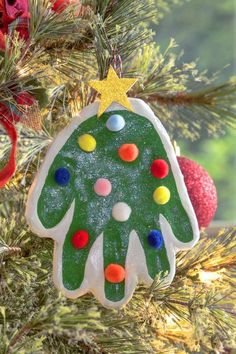 a christmas ornament hanging from a tree