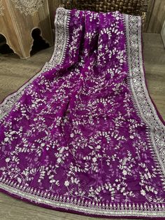 Gorgeous purple organza dupatta with silver embroidery and heavy sequins border. Silver Saree With Resham Embroidery For Eid, Silver Dupatta With Intricate Embroidery, Silver Traditional Wear With Chikankari Embroidery, Silver Georgette Dupatta With Resham Embroidery, Silver Dupatta With Resham Embroidery In Georgette, Elegant Silver Dupatta With Chikankari Embroidery, Intricate Embroidered Silver Dupatta For Eid, Traditional Silver Saree With Resham Embroidery, Eid Silver Dupatta With Resham Embroidery