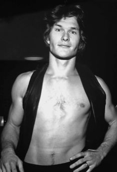 black and white photograph of a man with no shirt