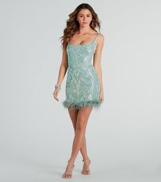 The iconic style of the Angie feather trim sequin formal mini dress will level up your formal look! She features a sleeveless square neckline, adjustable spaghetti straps for a customized fit, a flirty open back with a lace-up strappy design, a mini-length hem with a fabulous marabou feather trim, and a slim-fit silhouette. The lined mesh fabric features iridescent sequin embroidery in a gorgeous scroll pattern. Complete your look for HOCO or a dressy party with metallic heels!Fit & FeaturesSleeveless square neckline, adjustable spaghetti strapsOpen back, lace-up strappy design, tie closureHigh waist seam, lower back zipper, hook and eye closureMini-length hem, marabou feather trim, slim-fit silhouetteIridescent sequin embroidery, scroll patternSheer mesh fabric, full-length knit linin Glamorous Feather Trim Mini Dress For Homecoming, Glamorous Feathered Mini Dress For Homecoming, Glamorous Homecoming Mini Dress With Feather Trim, Evening Feather Trim Mini Dress For Prom, Evening Mini Dress With Feather Trim For Prom, Glamorous Feather Trim Mini Dress For Prom Season, Feather Trim Mini Dress For Prom, Feather Trim Mini Dress For Prom Season, Glamorous Mini Dress With Feather Trim For Prom