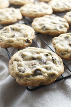 chocolate chip cookies cooling on a rack ready to go in the oven or baking dish