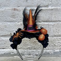 Stand out in the crowd this Halloween season with a colorful sparkly orange and black witchy headpiece, Glitter spider and glitter pumpkins will take your Halloween outfit to the next level. *Locally hand made in New Orleans. Headpieces usually ship within 3-5 business days. Please be aware that due to the unique and handmade nature of each product, color, shapes, and sizes may vary slightly from the photo and descriptions. Themed Halloween Costume Hats And Headpieces For Party, Themed Halloween Party Costume Hats And Headpieces, Witchy Black Costume Hat For Fall, Novelty Costume Hats And Headpieces For Halloween, Witchy Black Costume Hats And Headpieces For Fall, Themed Halloween Costume Hats And Headpieces, Themed Halloween Costume Hats And Headpieces For Costume Party, Halloween Themed Party Costume Accessories, Adjustable Costume Accessories For Carnival And Halloween