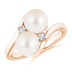 Two Freshwater cultured pearls are gracefully placed in between a bypass shank symbolizing togetherness between two souls. The prong set diamond accents look dainty with the pair of pearls and give a hint of sparkle to the double pearl ring. This femininely styled pearl bypass ring is in 14K Solid Gold. Birthstone for the month of June and traditional gemstone gift for 3rd, 30th, 46th, 50th & 52nd wedding anniversaries. All our items are packaged with care in appealing boxes with plush interiors Pearl Halo Ring, Akoya Pearl Ring, Tahitian Pearl Ring, Morganite Engagement Ring Set, Gold Diamond Wedding Rings, Cultured Pearl Ring, Pearl Rings, Freshwater Pearl Ring, June Birthstone Jewelry