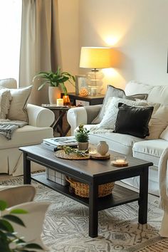 a living room with couches, chairs and a coffee table in front of a window