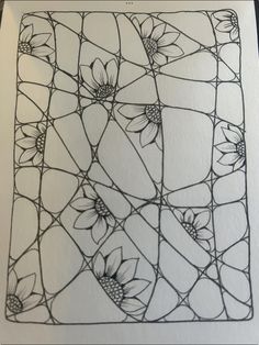 a piece of paper with flowers drawn on it