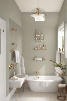 a white bath tub sitting next to a window