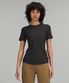 This lightweight everyday top has just the right softness, just the right stretch, and a snug fit that feels like a second skin. Designed for On the Move. Contours your body:Sits below the waistband for moderate, everyday coverage. 'Wash with like colours', 'Machine wash cold', 'Do not bleach', 'Tumble dry low', 'Do not iron', 'Do not dry clean', 'Imported'. Soft, Ribbed Modal Fabric. Body: 94% Lenzing modal, 6% Elastane. Lululemon Go-dry Short Sleeve T-shirt, Lululemon Gym T-shirt Short Sleeve, Lululemon Moisture-wicking Short Sleeve Top, Lululemon Stretch Short Sleeve T-shirt, Lululemon Relaxed Fit Short Sleeve T-shirt, Technical Clothing, Short Sleeve Shirt Women, Shorts With Tights, Leggings Shop