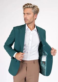 Boldly refined and fashion forward, the Bryant Diamantia Teal Stretch Jacket is crafted from unique stretch cotton fabric for extra comfort in an eye-catching and polished look that stands out in the sea of basic blazers. Modern Fitted Sport Coat With Suit Collar, Modern Fitted Sport Coat For Semi-formal Occasions, Modern Fitted Semi-formal Sport Coat, Modern Fitted Long Sleeve Suits, Modern Fitted Sport Coat With Concealed Placket, Green Slim Fit Blazer With Notch Lapel, Modern Formal Cotton Outerwear, Modern Fitted Sport Coat With Pressed Crease, Modern Cotton Sport Coat For Formal Occasions